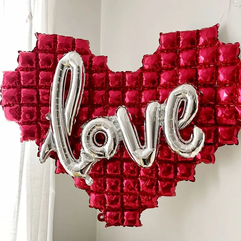 red heart with silver text