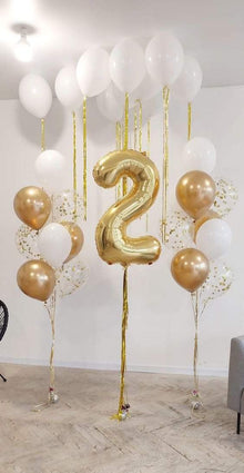 helium birthday set up with numbber