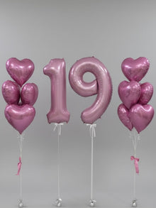 pink number and heart helium bunch