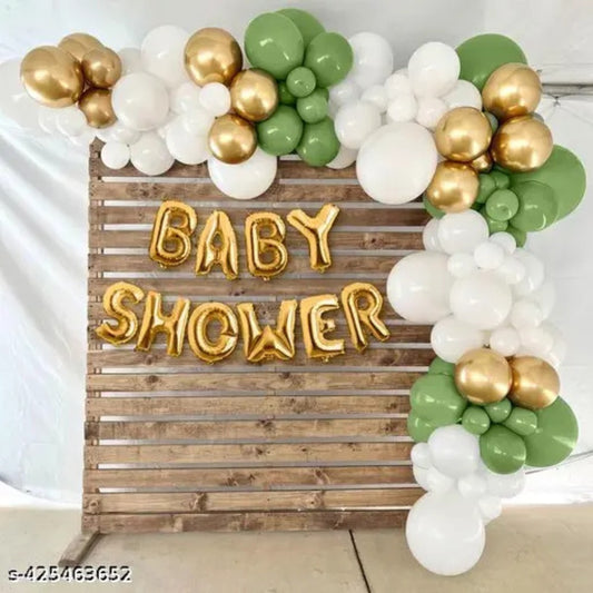Sage green, white  and gold balloon garland with baby shower text